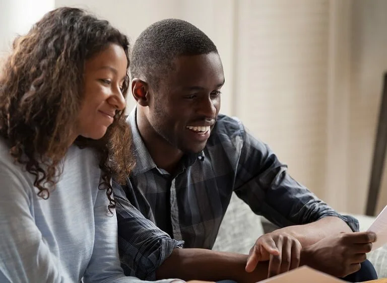 couple looking at credit score